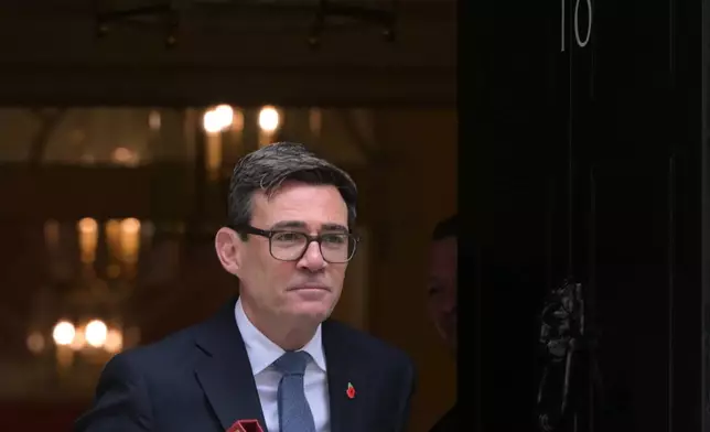 Britain's Prime Minister Andy Burnham leaves 10 Downing Street to attend the weekly Prime Ministers' Questions session in parliament in London, Wednesday, Oct. 28, 2026.(AP Photo/Thomas Krych)