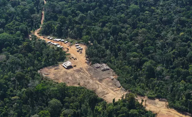 An illegal logging camp is visible in the Saamaka territory of the Amazon rainforest in Suriname, Wednesday, Sept. 30, 2026. (AP Photo/Ivan Valencia)