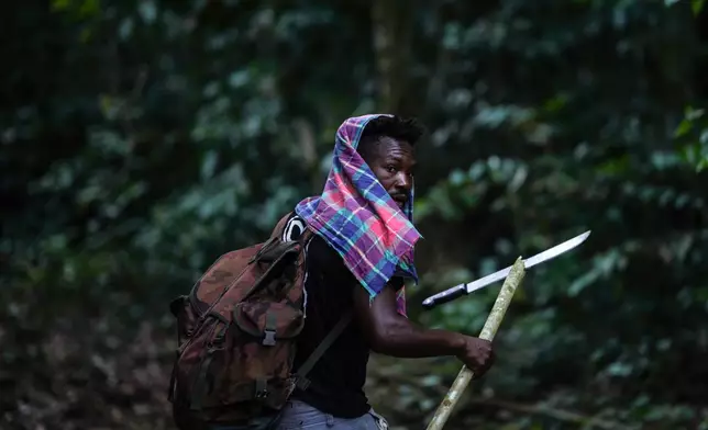 Navaldo Vola, member of the Saamaka community, patrols in Ebbatop, Suriname, Sunday, Sept. 27, 2026. (AP Photo/Ivan Valencia)
