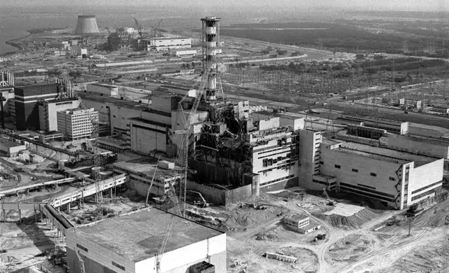 FILE - This aerial view shows the Chernobyl nuclear power plant in Chernobyl, Ukraine, April 26, 1986. (AP Photo/Volodymyr Repik, File)