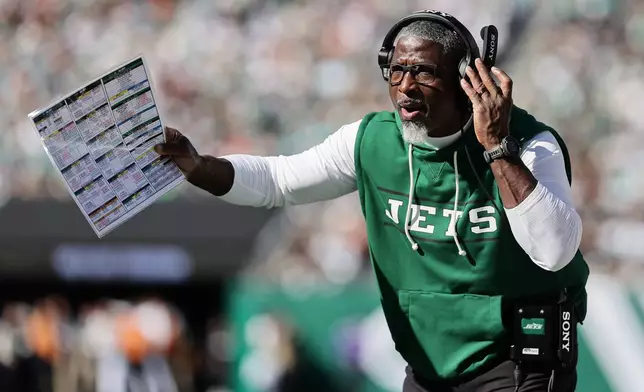 New York Jets head coach Aaron Glenn in the first half of an NFL football game against the Miami Dolphins in East Rutherford, N.J., Sunday, Oct. 25, 2026. (AP Photo/Adam Hunger)