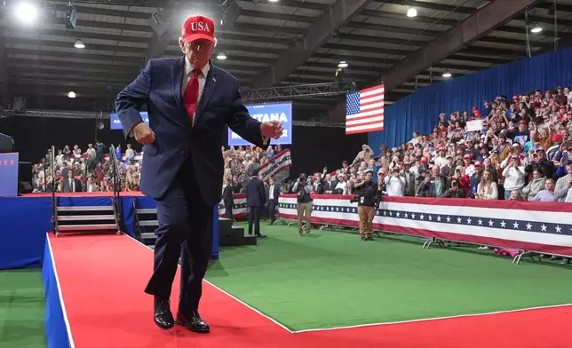 President Donald Trump dances at a campaign rally at Majestic Valley Arena, Wednesday, Oct. 14, 2026, in Kalispell, Mont. (AP Photo/Alex Brandon)