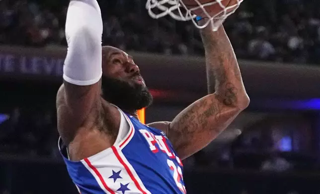 Philadelphia 76ers forward LeBron James dunks during the second half of an NBA basketball game against the New York Knicks Tuesday, Oct. 20, 2026, in New York. (AP Photo/Frank Franklin II)