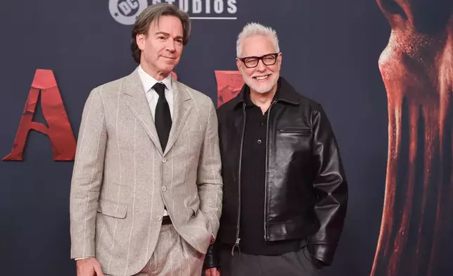 Peter Safran, left, and James Gunn arrive at the premiere of "Clayface" on Tuesday, Oct. 13, 2026, at the Hollywood Legion Theater in Los Angeles. (Photo by Richard Shotwell/Invision/AP)