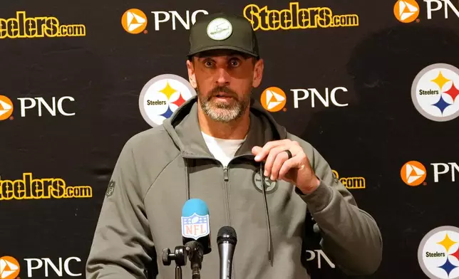 Pittsburgh Steelers quarterback Aaron Rodgers (8) speaks during a news conference following an NFL football game against the Tampa Bay Buccaneers in Tampa, Fla., Sunday, Oct. 18, 2026. (AP Photo/John Raoux)