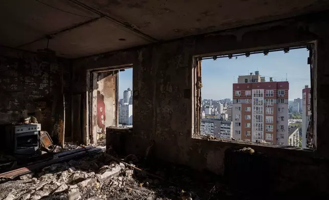 An apartment is seen burned out following a Russian drone strike in Kyiv, Ukraine, Friday, Oct. 2, 2026. (AP Photo/Evgeniy Maloletka)