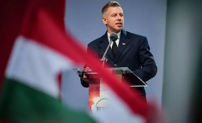 Hungarian Prime Minister Peter Magyar speaks during an event marking the 70th anniversary of the 1956 Hungarian Revolution against Soviet-backed communist rule in Budapest, Hungary, Friday, Oct. 23, 2026. (AP Photo/Pavel Bogolepov)