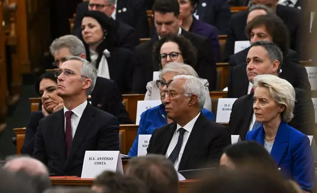 From left, Norway's Finance Minister Jens Stoltenberg, European Council President Antonio Costa and European Commission President Ursula von der Leyen attend the commemoration of the 70th anniversary of the outbreak of the Hungarian Revolution and Freedom Fight of 1956 against Soviet oppression in the Parliament in Budapest, Hungary, Friday, Oct. 23, 2026. (Robert Hegedus/MTI via AP)/MTI via AP)