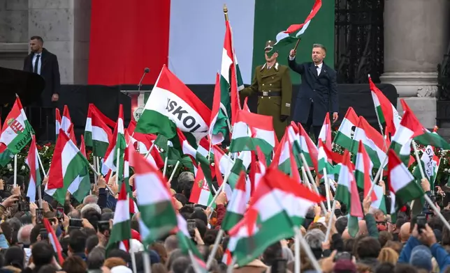 Hungarian Prime Minister Peter Magyar attends the commemoration for the 70th anniversary of Hungary’s 1956 anti-Soviet uprising, at Kossuth square, in front of Parliament in Budapest, Hungary, Friday, Oct. 23, 2026. (Boglarka Bodnar/MTI via AP)