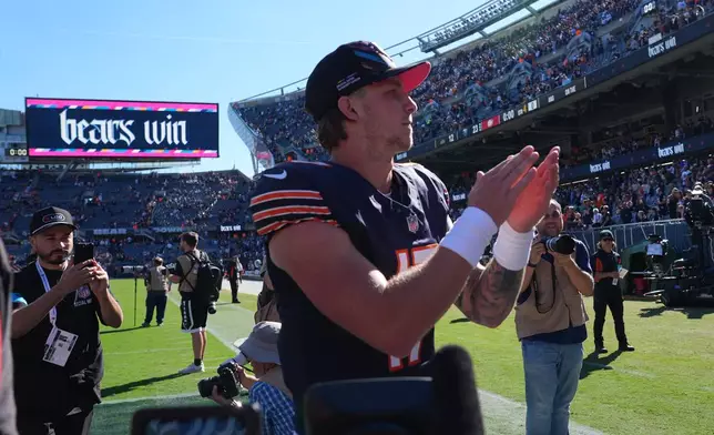 Chicago Bears quarterback Tyson Bagent celebrates a victory over the New York Jets as he walks off the field following an NFL football game Sunday, Oct. 4, 2026, in Chicago. (AP Photo/Nam Y. Huh)