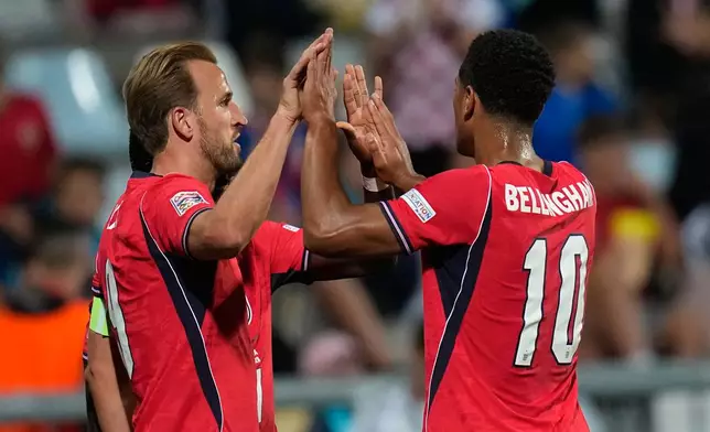 England's Harry Kane, left, and Jude Bellingham react after sixth goal during the Nations League soccer match between Croatia and England in Rijeka, Croatia, Saturday, Oct. 3, 2026. (AP Photo/Darko Bandic)