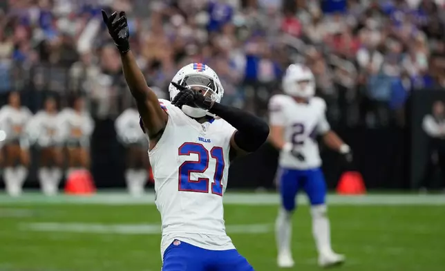 Buffalo Bills cornerback Davison Igbinosun (21) celebrates a play against the Las Vegas Raiders during an NFL football game in Las Vegas, Sunday, Oct. 18, 2026. (AP Photo/John Locher)