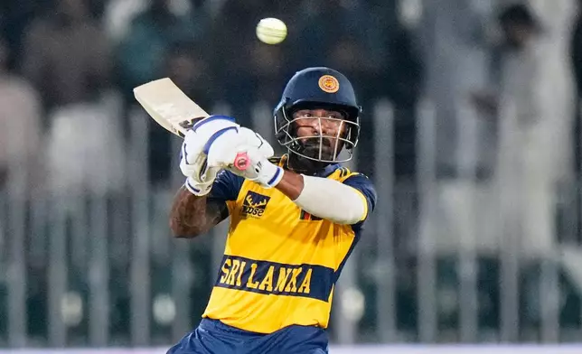Sri Lanka's Lahiru Udara plays a shot during the first T20 cricket match between Pakistan and Sri Lanka, in Rawalpindi, Pakistan, Friday, Oct. 9, 2026. (AP Photo/Anjum Naveed)