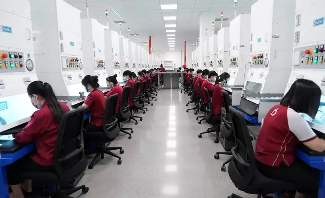 Craftspersons create jewelry pieces at the Pandora factory in Ho Chi Minh city, Vietnam, Wednesday, Sept.30, 2026. (AP Photo/Hau Dinh)