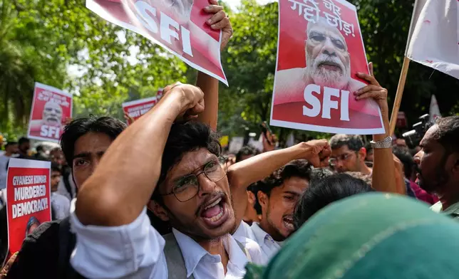 Socialist, left-wing parties and student activists shout slogans during a protest against Chief Election Commissioner Gyanesh Kumar and calling for the suspension of the Special Intensive Revision (SIR) of electoral rolls in New Delhi, India, Friday, Oct. 2, 2026. (AP Photo/Manish Swarup)