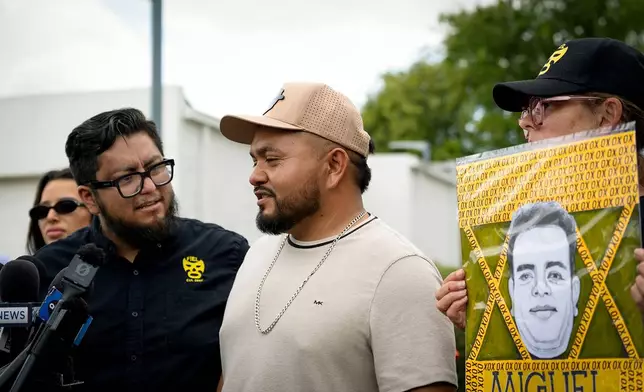 Rodolfo Parra, brother of Miguel Parra-Hernandez, speaks to the media Monday, Oct. 12, 2026, alongside Cesar Espinosa, executive director of FIEL, near the scene on Clay Road near Texas 6 in Houston where Parra-Hernandez was struck by ICE agents after running from an SUV pursuing another man. (Jill Karnicki/Houston Chronicle via AP)