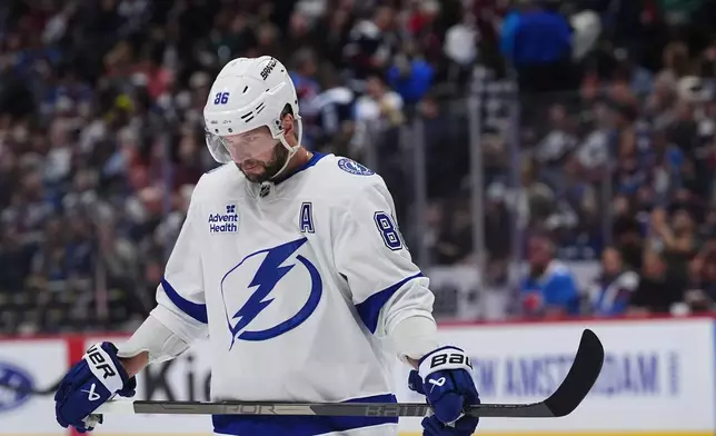 Tampa Bay Lightning right wing Nikita Kucherov waits for a face-off in the first period of an NHL hockey game against the Colorado Avalanche, Friday, Oct. 23, 2026, in Denver. (AP Photo/David Zalubowski)