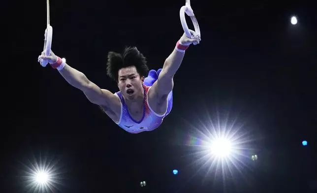 Ryosuke Doi, of Japan, competes in the rings during the men's qualifications at the Artistic Gymnastics World Championships in Rotterdam, the Netherlands, Saturday, Oct. 17, 2026. (AP Photo/Francisco Seco)