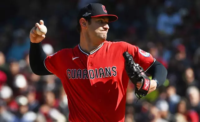 Cleveland Guardians pitcher Gavin Williams throws against the Cleveland Guardians during the first inning in Game 3 of baseball's American League Championship Series baseball game in Cleveland, Thursday, Oct. 15, 2026. (AP Photo/Phil Long)