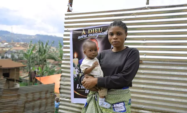 Sagesse Kavira, the daughter of Marie-Célestin Karondwa, a local official who was beaten to death after publicly defending the government's response to Ebola, in Butembo, Congo, Wednesday, Sept. 30, 2026. (AP Photo/Sebastien Kitsa Musayi)