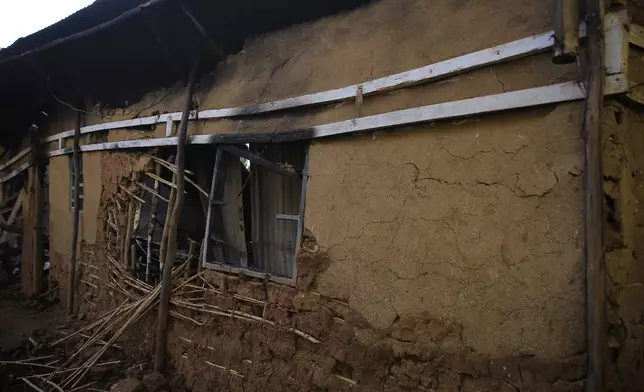 The burned home of Marie-Célestin Karondwa, a local official who was beaten to death after publicly defending the government's response to Ebola, in Butembo, Congo, Wednesday, Sept. 30, 2026. (AP Photo/Sebastien Kitsa Musayi)