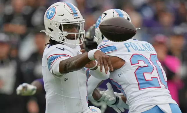 Tennessee Titans quarterback Cam Ward throws a pass during the first half of an NFL football game against the Baltimore Ravens in Baltimore, Sunday, Oct. 4, 2026. (AP Photo/Stephanie Scarbrough)