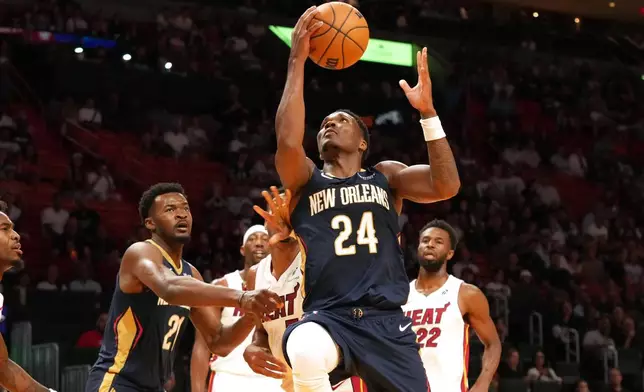 New Orleans Pelicans guard Bennedict Mathurin (24) aims to score during the first half of an NBA preseason basketball game against the Miami Heat Thursday, Oct. 8, 2026, in Miami. (AP Photo/Marta Lavandier)