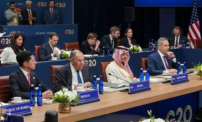 Mexico's Foreign Minister Roberto Velasco, Russia's Foreign Minister Sergei Lavrov, Saudi Arabia's Foreign Minister Faisal bin Farhan, Turkey's Foreign Minister Hakan Fidan attend the G20 Foreign Ministers Meeting in Atlanta, Friday, Oct. 30, 2026. (Megan Varner/Pool Photo via AP)