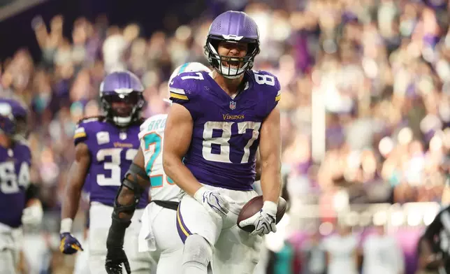 Minnesota Vikings tight end T.J. Hockenson reacts after a play against the Miami Dolphins during the second half of an NFL football game Sunday, Oct. 4, 2026, in Minneapolis. (AP Photo/Matt Krohn)