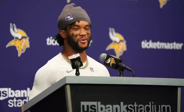 Minnesota Vikings quarterback Kyler Murray speaks to reporters following an NFL football game against the Miami Dolphins Sunday, Oct. 4, 2026, in Minneapolis. (AP Photo/Abbie Parr)