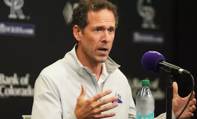 Paul DePodesta, president of baseball operations for the Colorado Rockies, responds to question during an end-of-season press conference Tuesday, Oct. 6, 2026, in Coors Field in Denver. (AP Photo/David Zalubowski)