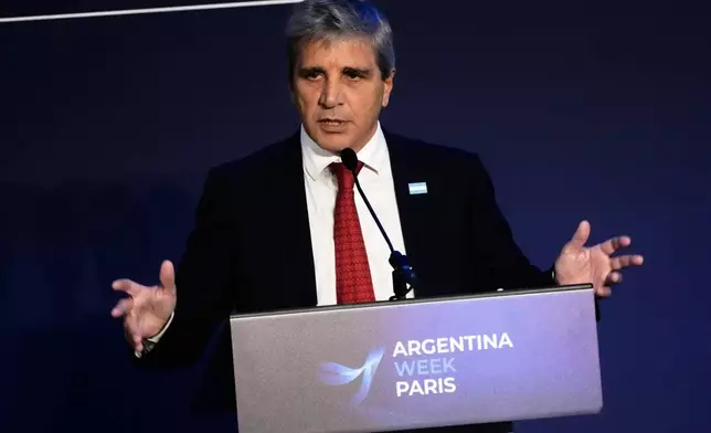 Argentina's Minister of Economy Luis Caputo delivers a statement at the Organisation for Economic Co-operation and Development (OECD) headquarters, ahead of the ''Argentina Week'', an event aimed at promoting investment and business opportunities, in Paris, Thursday, Oct. 1, 2026. (AP Photo/Teresa Suarez)