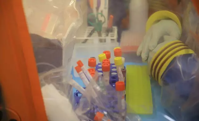 Tubes to collect blood samples are organized inside a mobile lab to test rapidly for Ebola virus in Butembo, Congo, Wednesday, Sept. 30, 2026. (AP Photo/Sebastien Kitsa Musayi)