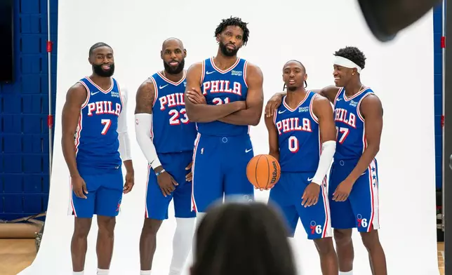 Philadelphia 76ers' Jaylen Brown, LeBron James, Joel Embiid, Tyrese Maxey, and VJ Edgecombe *left to right pose for photos during the NBA basketball team's media day, Monday, Sept. 28, 2026, in Camden, N.J.. (AP Photo/Chris Szagola)