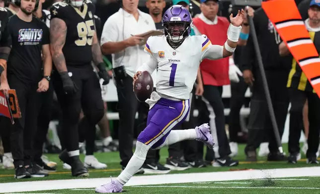 Minnesota Vikings quarterback Kyler Murray (1) runs against the New Orleans Saints during the second half of an NFL football game in New Orleans, Sunday, Oct. 11, 2026. (AP Photo/Matthew Hinton)