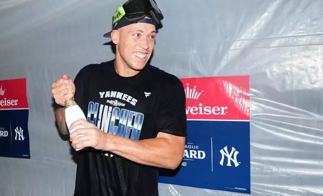 New York Yankees' Aaron Judge celebrates after winning baseball's American League Wild Card Series against the Boston Red Sox in Game 2, Wednesday, Sept. 30, 2026, in New York. (AP Photo/Frank Franklin II)