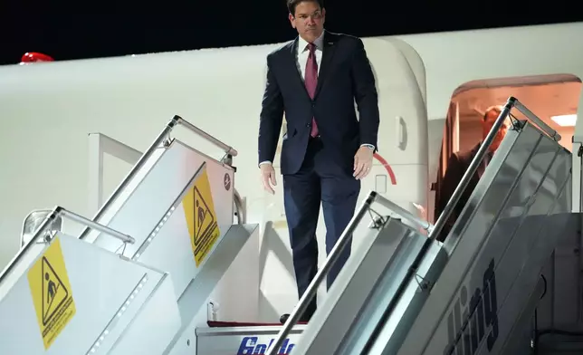 U.S. Secretary of State Marco Rubio steps off a plane at Athens' Eleftherios Venizelos international airport, near Athens , Greece, on Tuesday, Oct. 6, 2026.(AP Photo/Mark Schiefelbein, Pool)