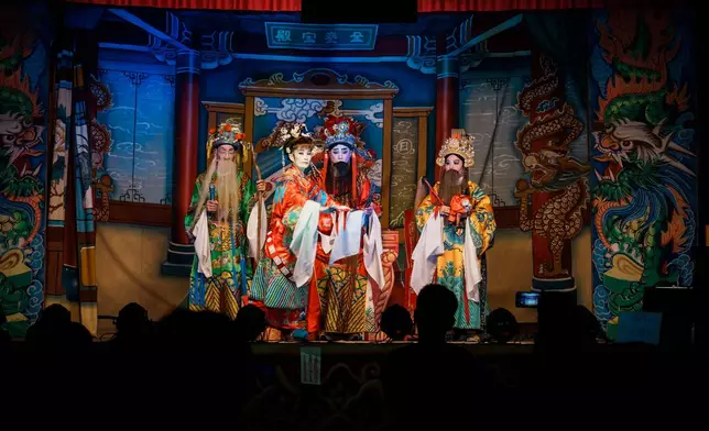 Actors perform in an opera show during the Nine Emperor Gods Festival at the Nine Emperor Gods Temple in Ampang, Malaysia, Friday, Oct. 16, 2026. (AP Photo/Vincent Thian)