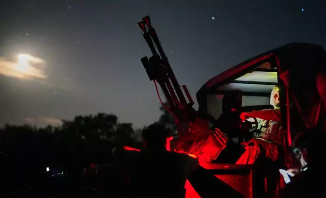 A Ukrainian air defense soldier gets ready to repel Russia's drone attack in Kyiv, Ukraine, Saturday evening, Sept. 19, 2026. (AP Photo/Efrem Lukatsky)
