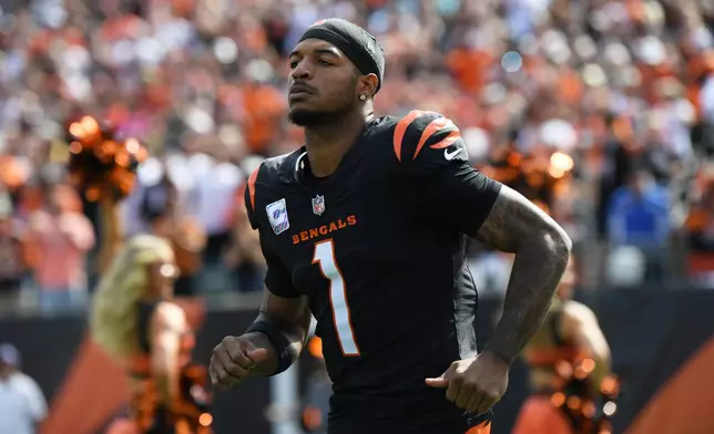Cincinnati Bengals wide receiver Ja'marr Chase (1) runs out during an NFL football game against the Jacksonville Jaguars in Cincinnati, Sunday, Oct. 4, 2026. (AP Photo/Tanner Pearson)