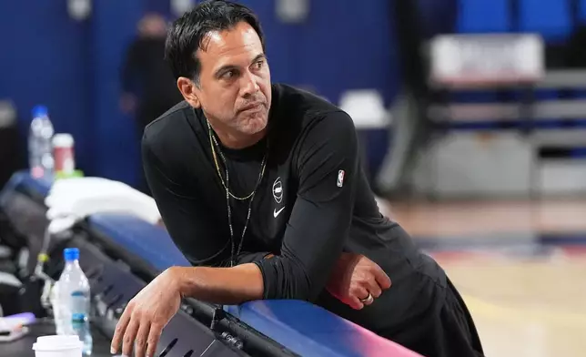 Miami Heat head coach Erik Spoelstra watches as players do drills during NBA basketball training camp, Tuesday, Sept. 29, 2026, in Boca Raton, Fla. (AP Photo/Lynne Sladky)