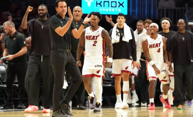 Miami Heat head coach Erik Spoelstra applauds at the end of the second half of an NBA preseason basketball game against the New Orleans Pelicans Thursday, Oct. 8, 2026, in Miami. (AP Photo/Marta Lavandier)