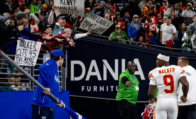 Kansas City Chiefs running back Kenneth Walker III (9) runs to the locker room after a loss to his former team the Seattle Seahawks at an NFL football game in Seattle, Sunday, Oct. 25, 2026. (AP Photo/Rio Giancarlo)