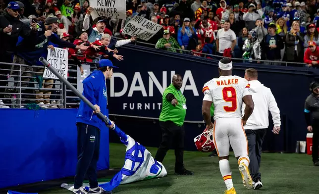 Kansas City Chiefs running back Kenneth Walker III (9) runs to the locker room after a loss to his former team the Seattle Seahawks at an NFL football game in Seattle, Sunday, Oct. 25, 2026. (AP Photo/Rio Giancarlo)