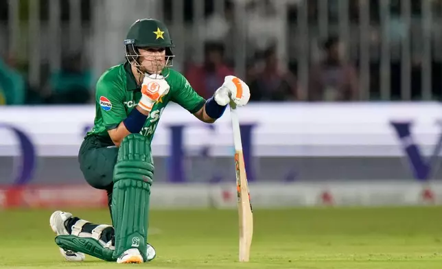 Pakistan's Maaz Sadaqat reacts after his dismissal during the second T20 cricket match between Pakistan and Sri Lanka, in Rawalpindi, Pakistan, Sunday, Oct. 11, 2026. (AP Photo/Anjum Naveed)