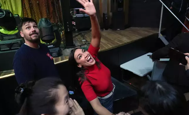 Rep. Alexandria Ocasio-Cortez, D-N.Y., waves after a campaign rally for Randy Villegas, Democratic candidate for congress in California's 22nd District, Friday, Oct. 23, 2026, in Bakersfield, Calif. (AP Photo/Jae C. Hong)