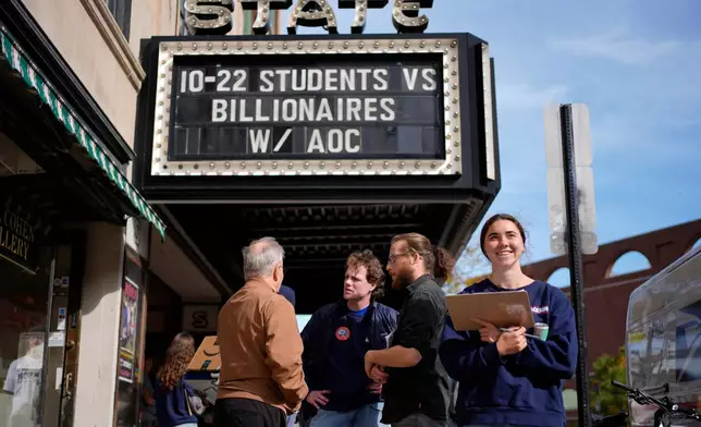 Recruiters for Troy Jackson, Democratic candidate for U.S. Senate, seek canvassing volunteers for the final days before the midterm elections, prior to an campaign event with Rep. Alexandria Ocasio-Cortez, D-N.Y., Thursday, Oct. 22, 2026, in Portland, Maine. (AP Photo/Robert F. Bukaty)