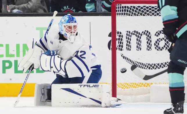 Toronto Maple Leafs goaltender Sergei Bobrovsky watches a goal by Seattle Kraken defenseman Ryker Evans go in the net during the second period of an NHL hockey game, Wednesday, Oct. 28, 2026, in Seattle. (AP Photo/Lindsey Wasson)