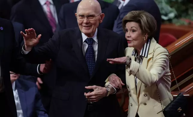 President Dallin H. Oaks and his wife, Sister Kristen M. Oaks, exit the morning session of the 196th Semiannual General Conference of the Church of Jesus Christ of Latter-day Saints, Saturday, Oct. 3, 2026, in Salt Lake City. (Erin Hooley/The Deseret News via AP)