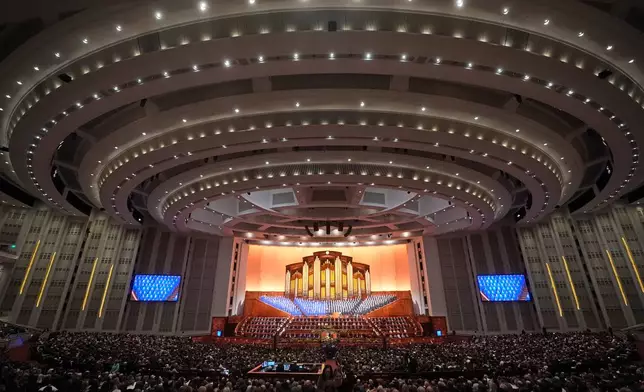 FILE - People attend the conference of the Church of Jesus Christ of Latter-day Saints, April 7, 2024, in Salt Lake City. (AP Photo/Rick Bowmer, File)